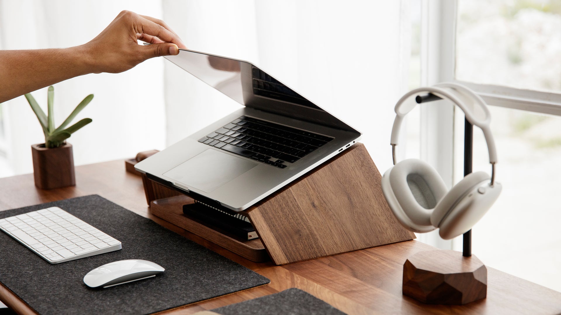 macbook pro on a laptop stand