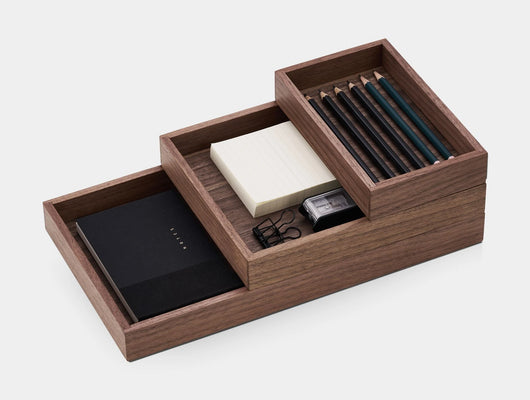 Wooden desk organizer with stationery items on Oakywood Stackable Valet Trays Bundle in walnut – stylish dark wood trays for multi-level desk organization | walnut,