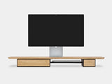Modern monitor stand  a white background oakywood wooden desk shelf pro, solid wood monitor stand side view | light oak, single drawer, black