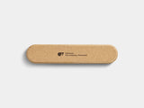 Oakywood to-do desk kit is lined with cork  with a logo engraved on it | oak