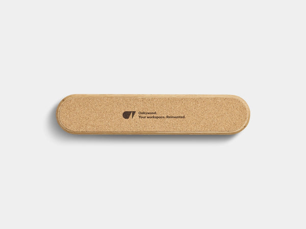 Oakywood to-do desk kit is lined with cork  with a logo engraved on it | oak