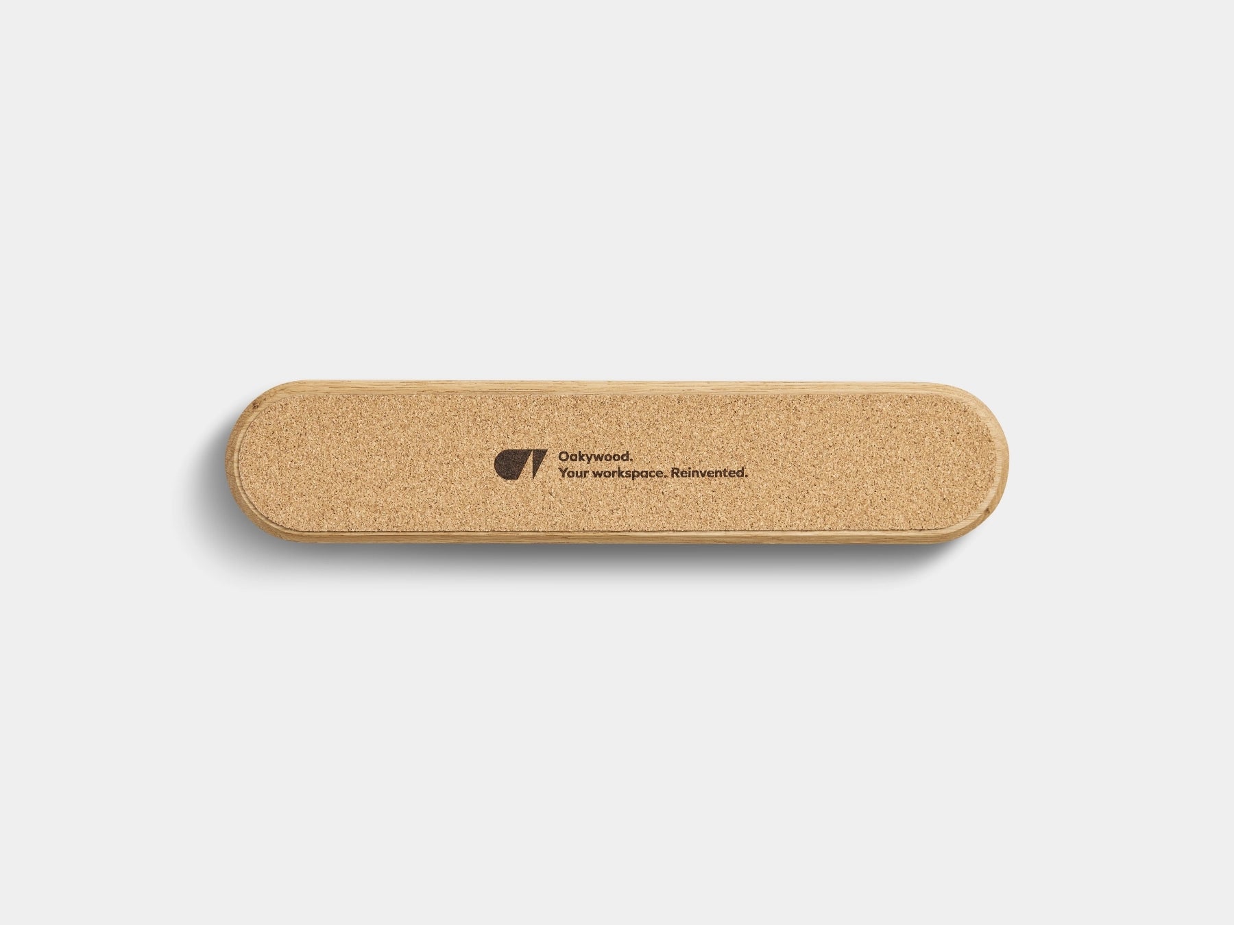 Oakywood to-do desk kit is lined with cork  with a logo engraved on it | oak
