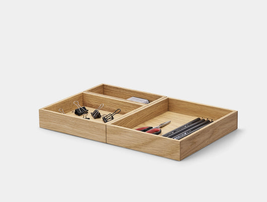 Wooden desk organizer with compartments holding office supplies on a white background | oak,set