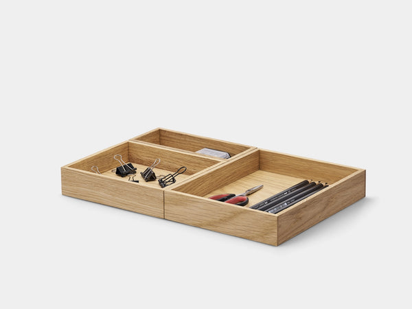 Wooden desk organizer with compartments holding office supplies on a white background | oak,set