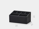 Black rectangular organizer with multiple compartments on a white background| black