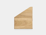 Wooden cutting board with a unique geometric shape on a white background| oak