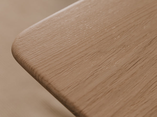 Close-up of a wooden surface with a blurred background  | light oak,