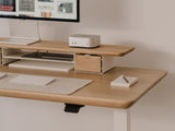 Wooden desk with computer setup on a neutral background |light oak, , 