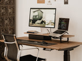 Home office setup with a wooden desktop, chair, computer monitor| walnut veneer,