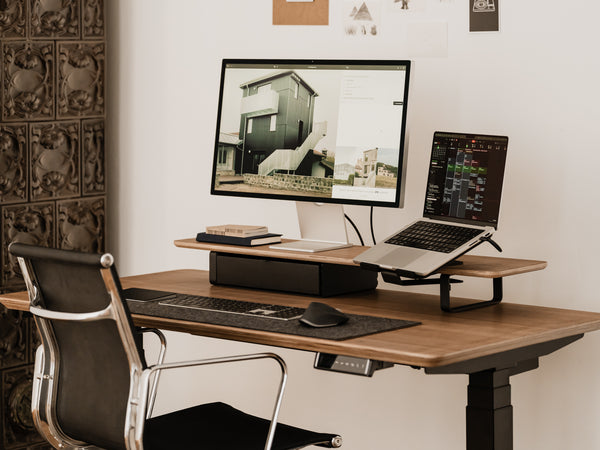 Home office setup with a wooden desktop, chair, computer monitor| walnut veneer,