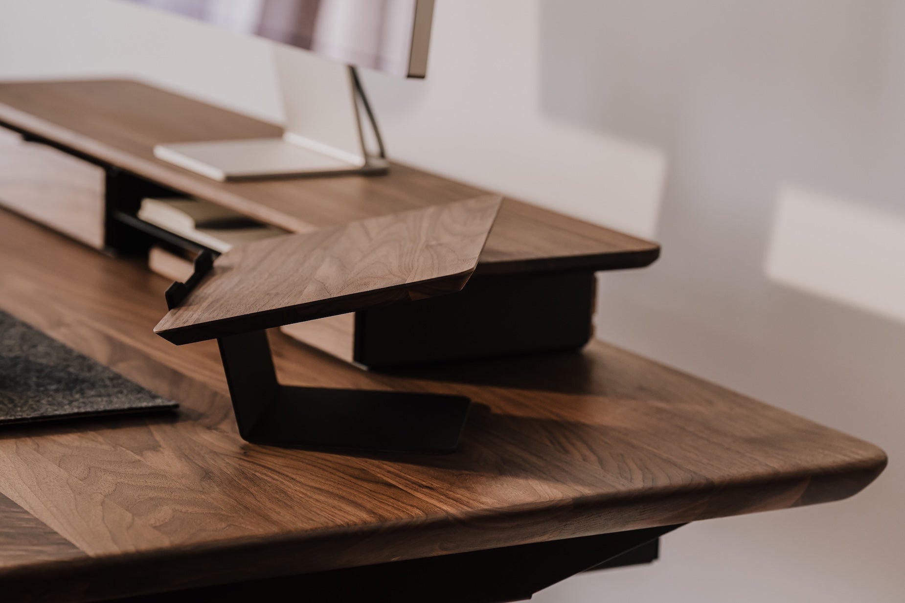 Wooden desk with a laptop on a white background Oakywood Laptop Riser | walnut,