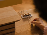 Magnetic cable organizer in oak and white – elegant wooden accessory for desk organization | oak, white