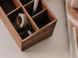 Wooden desk organizer with office supplies on a neutral background | walnut