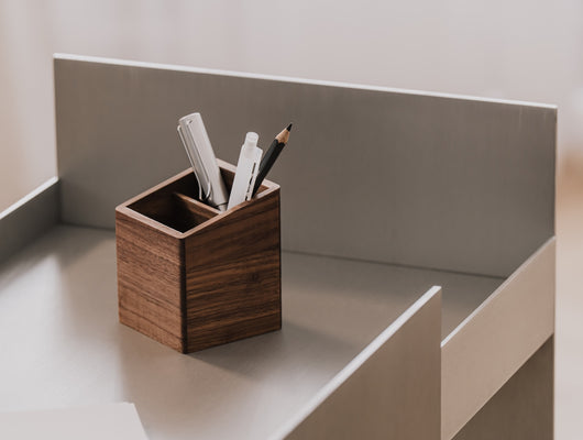 Wooden pen holder with stationery items on a desk  | walnut