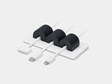 Magnetic cable organizer in black and white – stylish desktop accessory for tidy cable storage | black, white