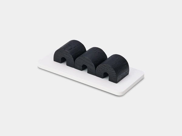 Black and white magnetic cable holder – functional solution for keeping cords organized | black, white