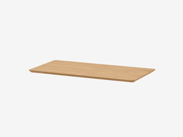 Wooden cutting board in medium-dark wood finish with beveled edges
