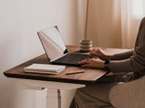 Compact Standing Desk Pro Mini in a modern workspace with height-adjustable frame | walnut, ,