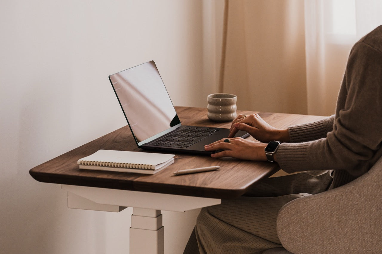 Compact Standing Desk Pro Mini in a modern workspace with height-adjustable frame | walnut, ,