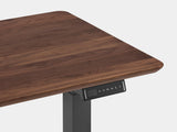 oakywood walnut standing desk touch with black legs closeup | walnut, , black