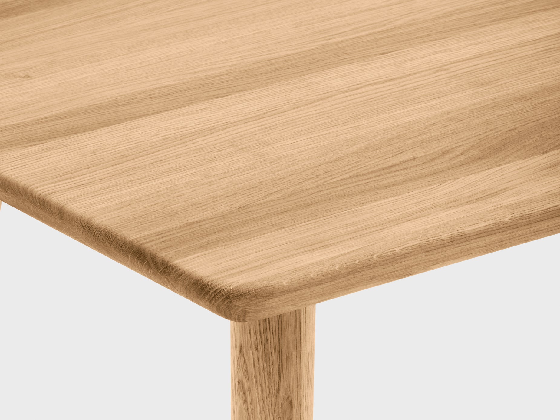 A simple wood desk with A-frame legs shown on white studio backdrop; light wood finish.